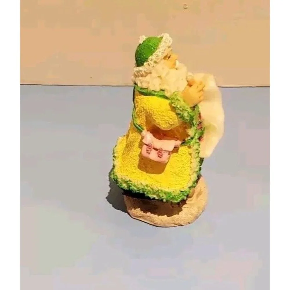 Santa Claus Naughty & Nice List Christmas Figurine In Pastel Yellow Robe Xmas